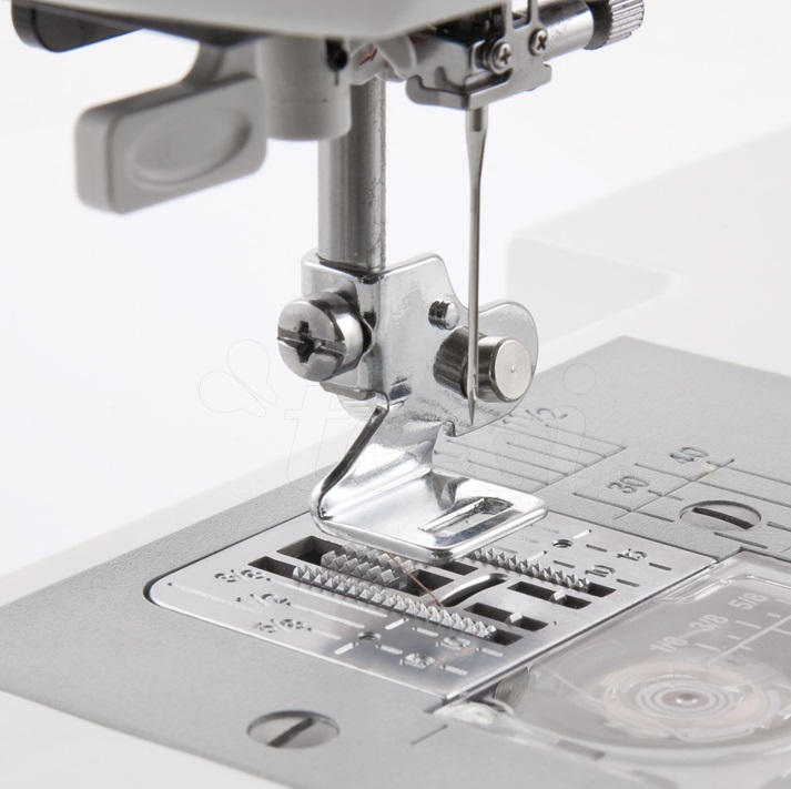 Držák lemovače pro šicí stroje TEXI 2001